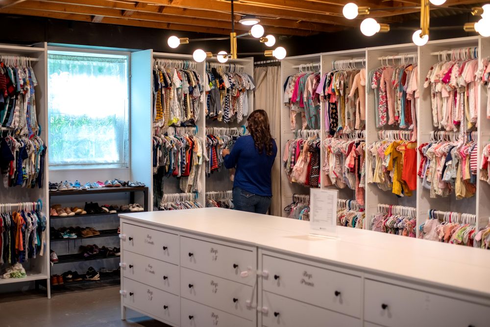 Woman browsing items at the Compassion Care Center boutique